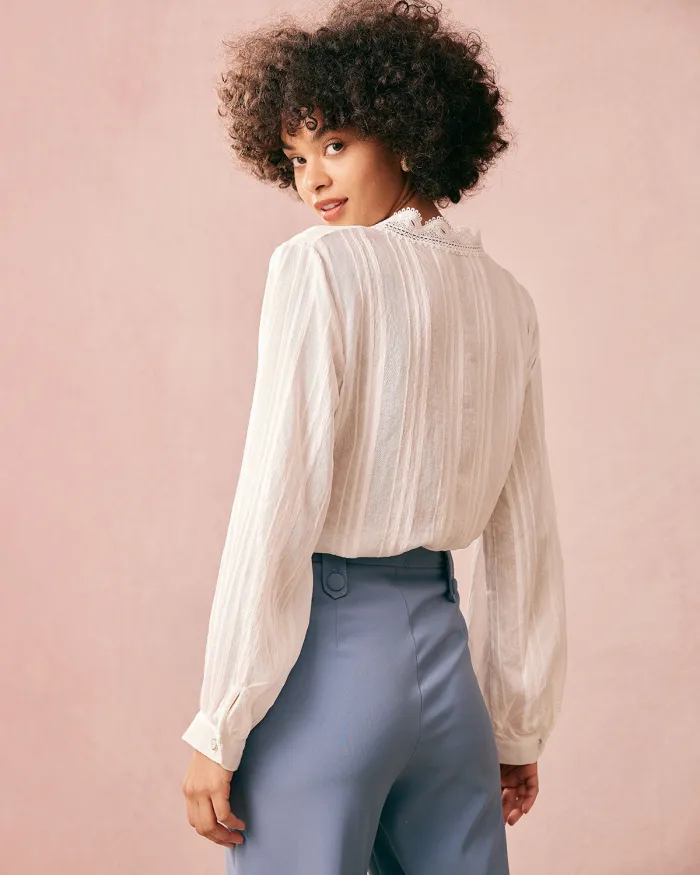 The White V Neck Lace Trim Long Sleeve Blouse
