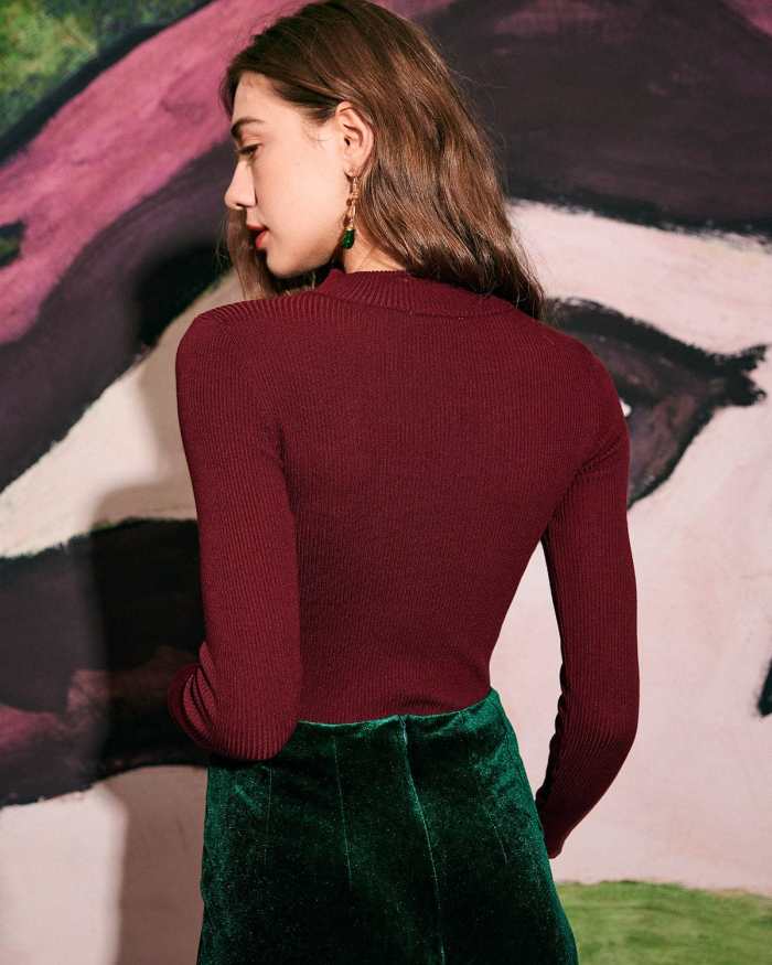 The Slim-Fitting Cutout Knit Top