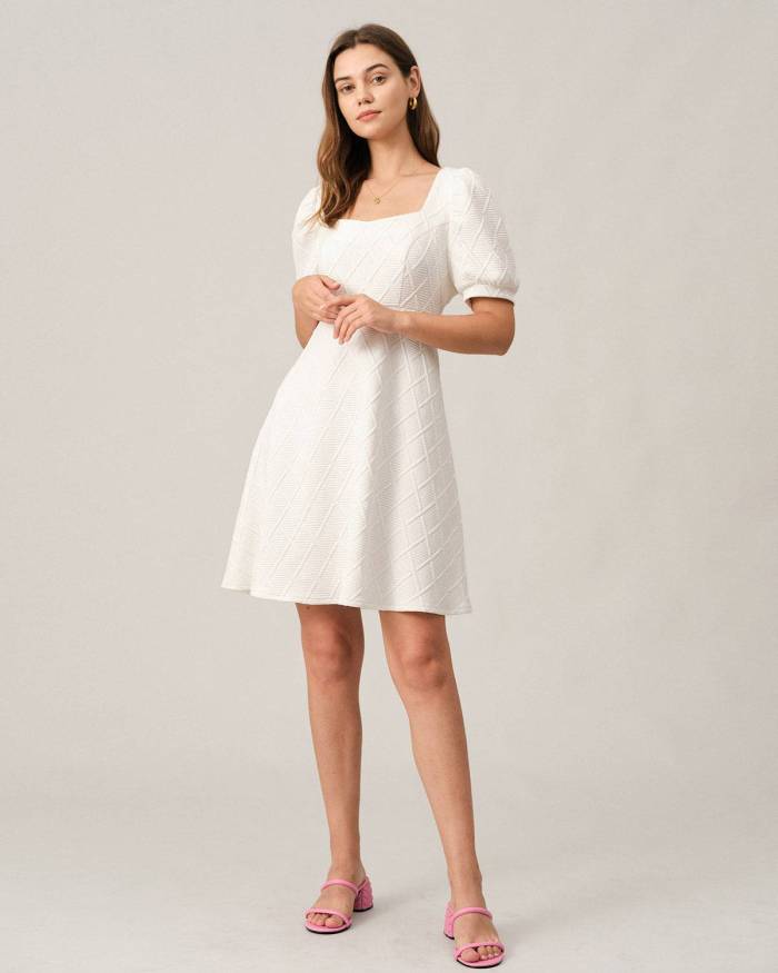 The Solid Textured Puff Sleeve Mini Dress