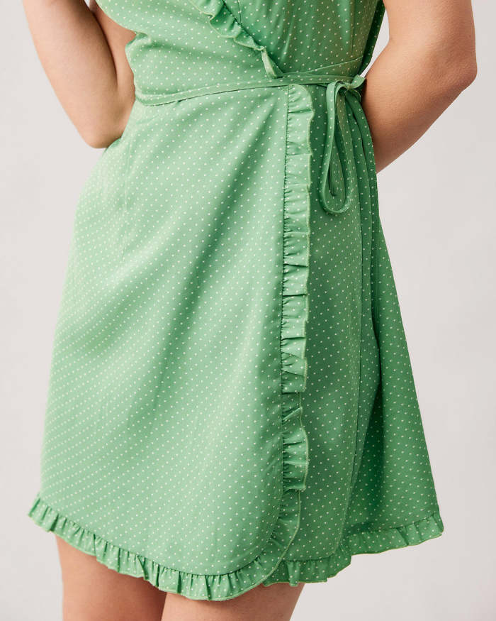 The Green V Neck Polka Dot Ruffled Wrap Mini Dress