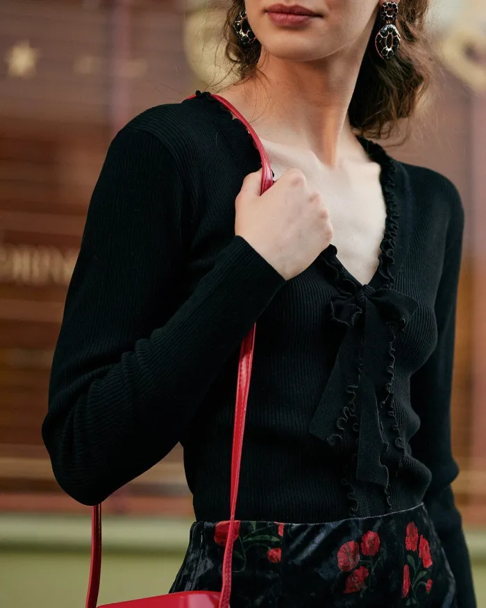 The Solid V Neck Frill Slim Fit Knit Top