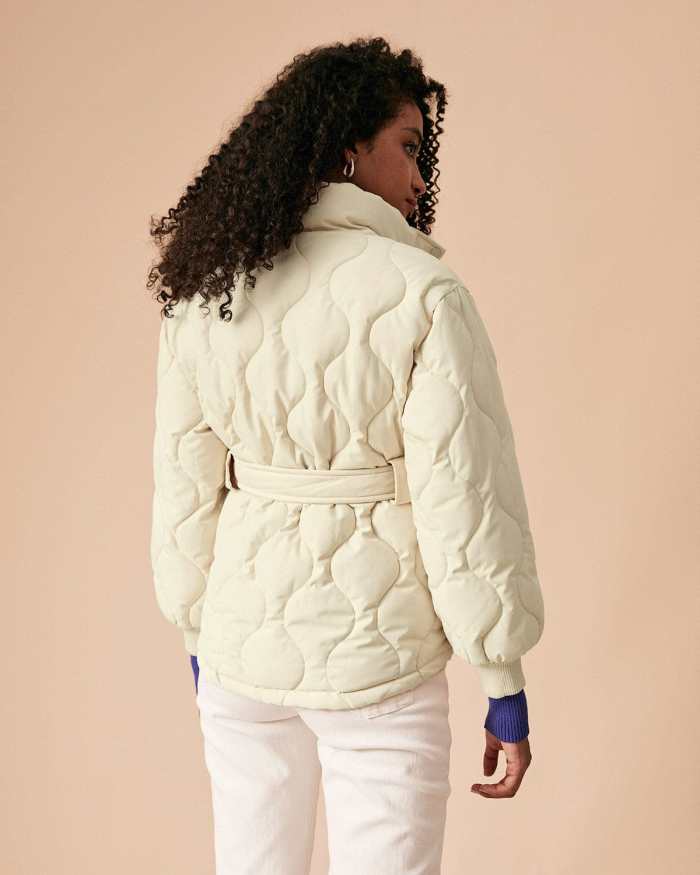 The Beige Mock Neck Belted Quilted Puffer Jacket