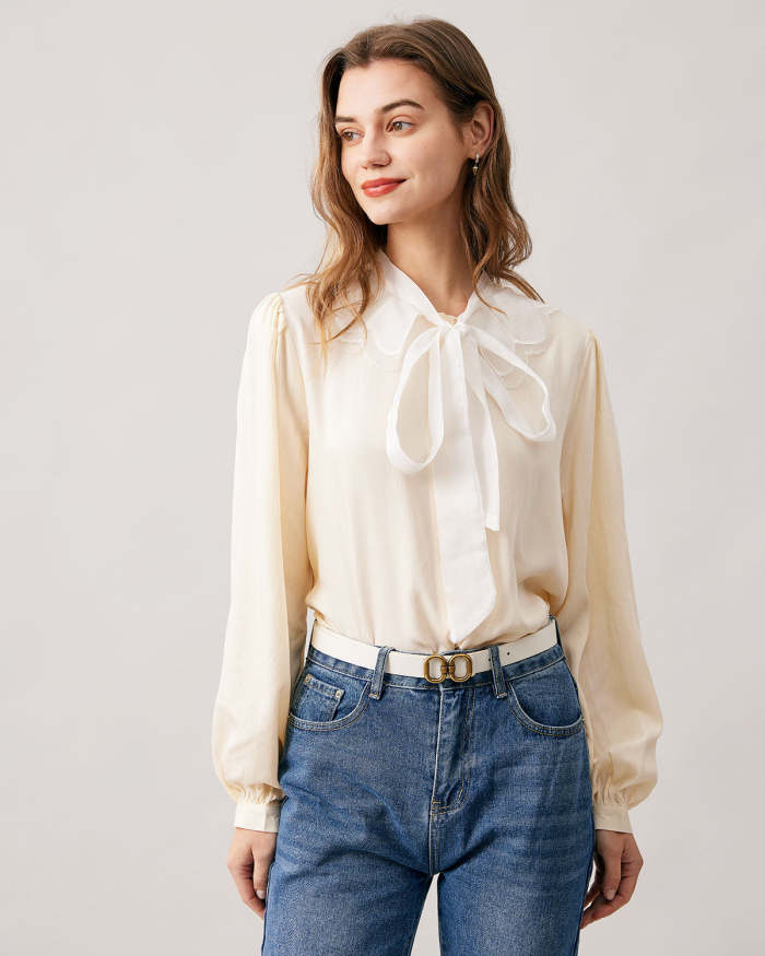 The Apricot Tie Neck Puff Sleeve Spliced Blouse