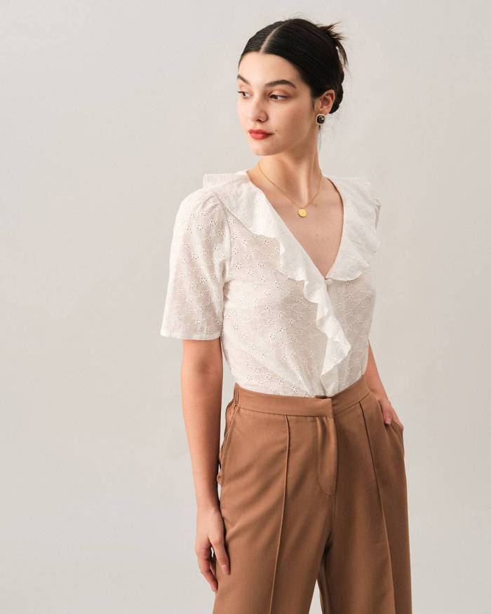 The Solid V Neck Ruffle Blouse