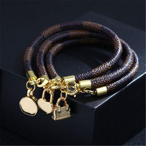 New Pu Stripe Leather Bracelet With Copper Buckle Plated With Real Gold Round Mini Bag