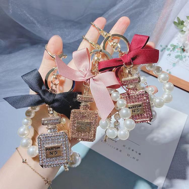 Luxury ornament perfume bottles car key ring women jewelry key chain