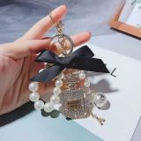 Luxury ornament perfume bottles car key ring women jewelry key chain