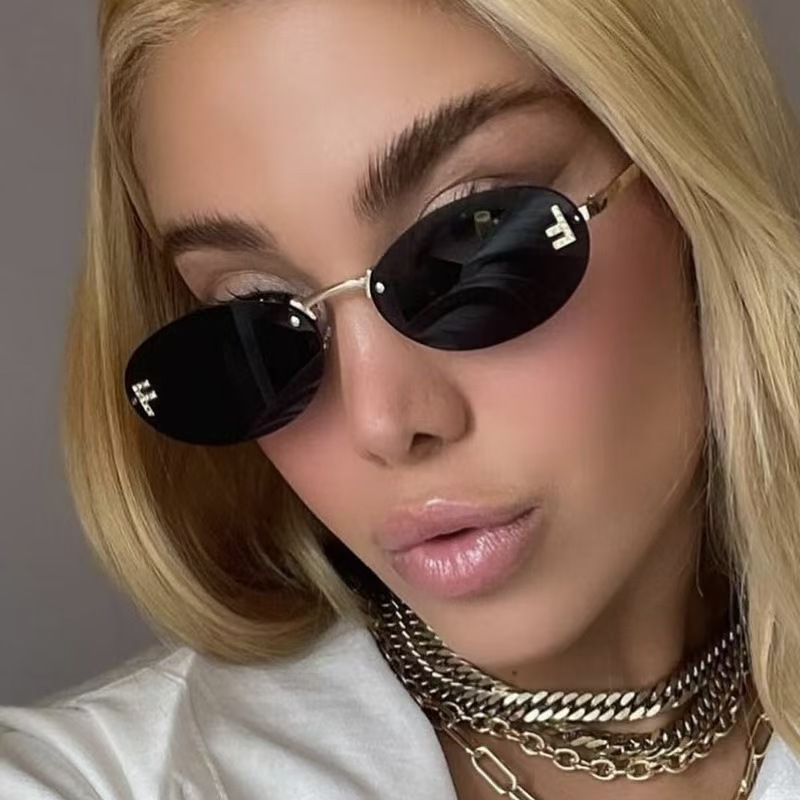 New frameless sunglasses with diamond studded oval frame