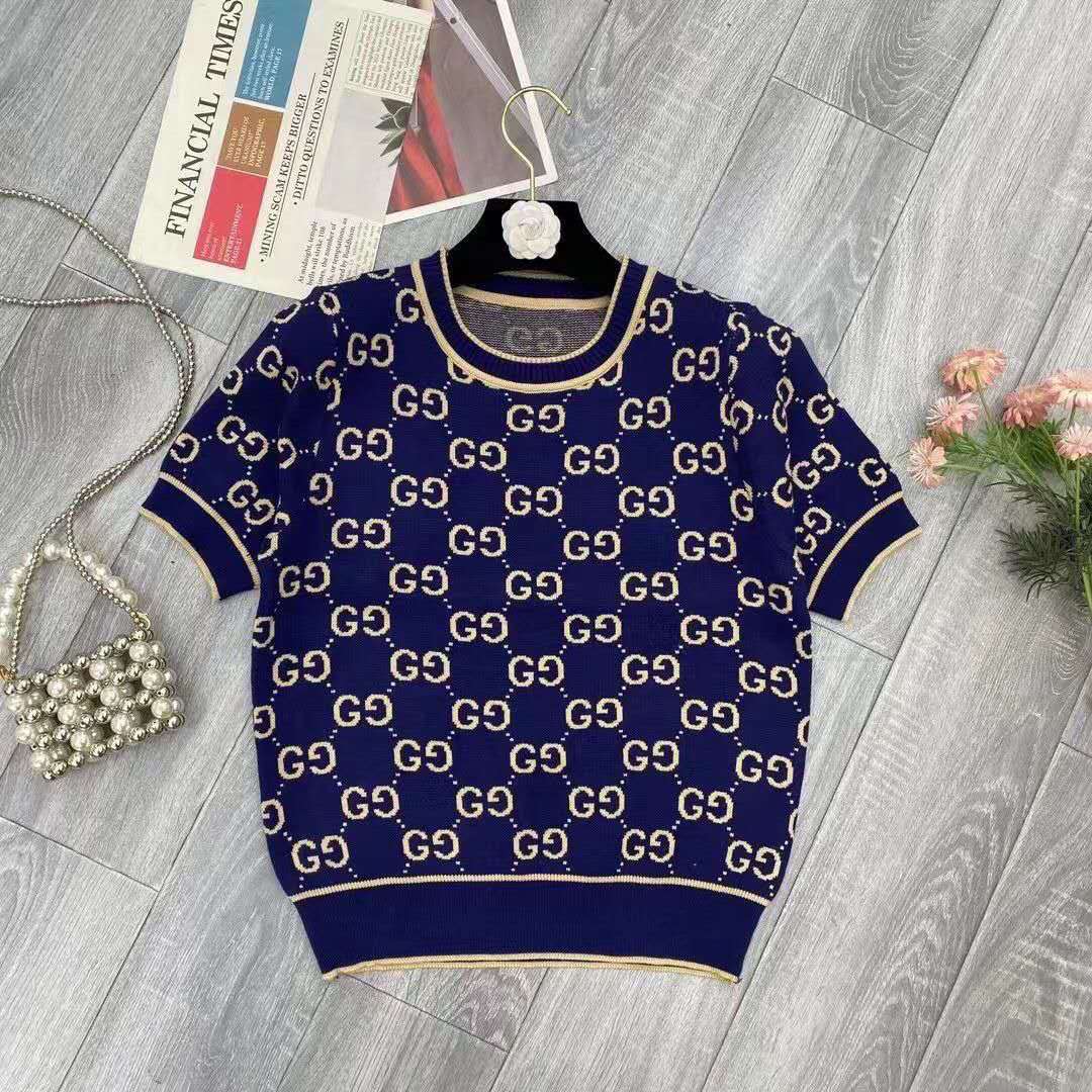Spring and summer new light luxury socialite style letter jacquard slant shoulder slant collar short sleeved metal chain knitted sweater