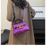 Versatile Shoulder-Slung Handbag with a Twist