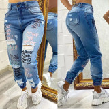 Ihoov Letter-Cut Distressed Skinny Jeans