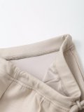 Reversible Fabric Hoodie with Decorative Stitching and Flared Pants
