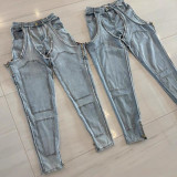 Irregular Hollow-out Stitching Zipper Stretch Denim Pants