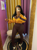 Sporty Chic Two-Piece Color Block Crop Top and High-Waisted Flare Pants Set
