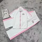 Stylish women's knit set with rhinestone-embellished letter embroidery and wide-leg trousers