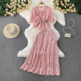 High-waisted midi skirt from the Elegance Duo set, highlighting the flowing fabric and subtle hem flair