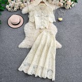 Close-up of delicate lace embroidery on the Elegance Duo blouse