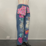 Distressed Denim Jeans with Strategic Rhinestone Embellishments