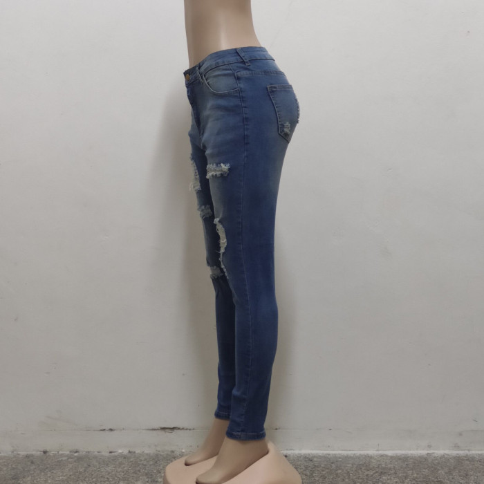 Fashion high waist jeans with holes