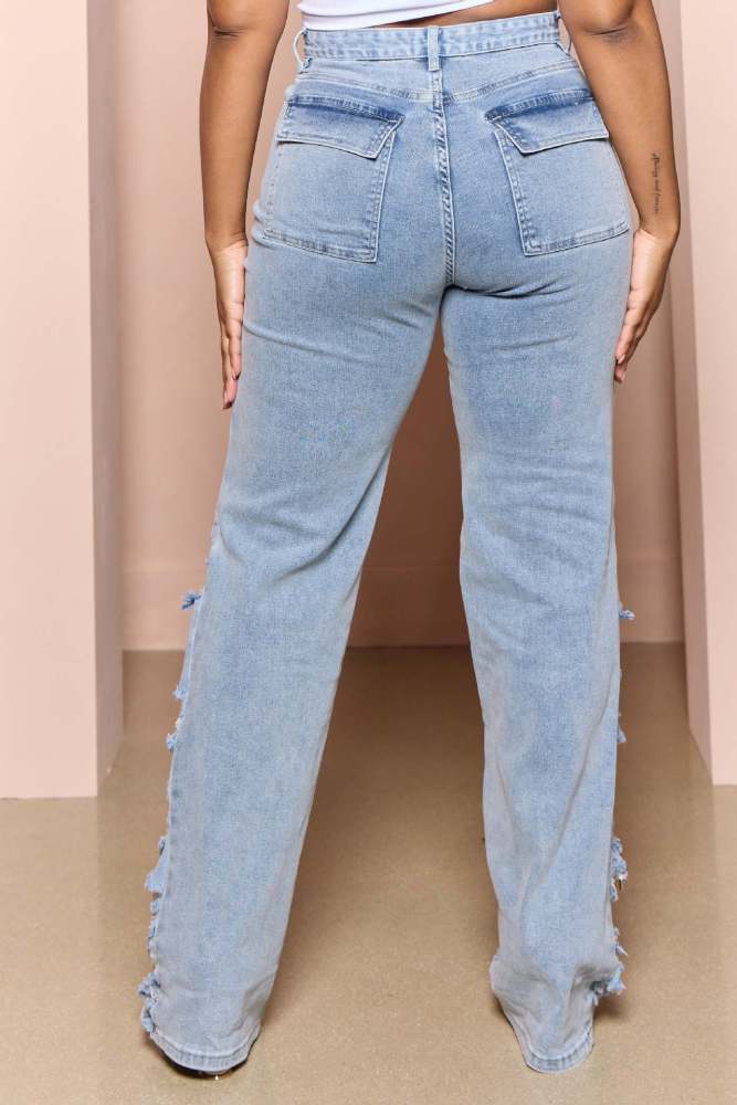 Fashionable loose fitting high waisted wide leg torn jeans
