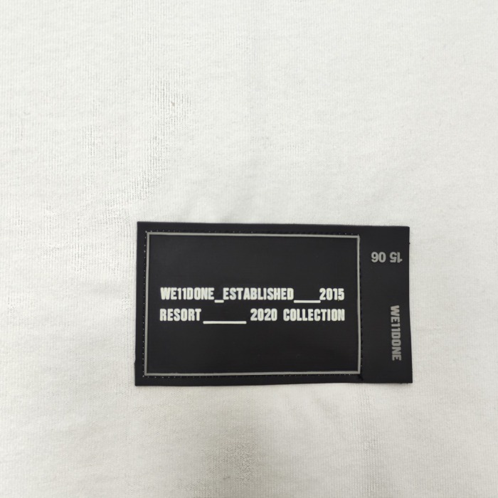 WE11D0NE Embroidered Logo Simple Color T-Shirt