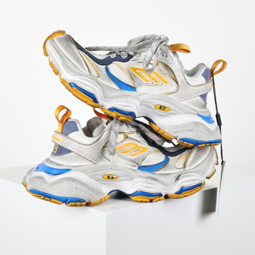 Balenciaga Cargo sneakers in a worn-out white, grey, orange, and blue