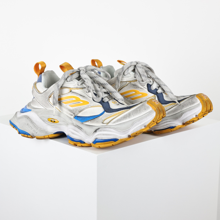 Balenciaga Cargo sneakers in a worn-out white, grey, orange, and blue