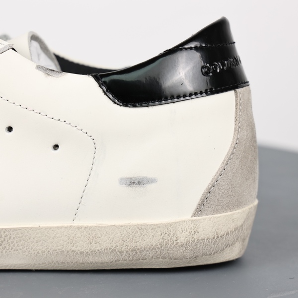 Golden G00se Superstar Wth Gold Star And Black Glitter Heel Tab