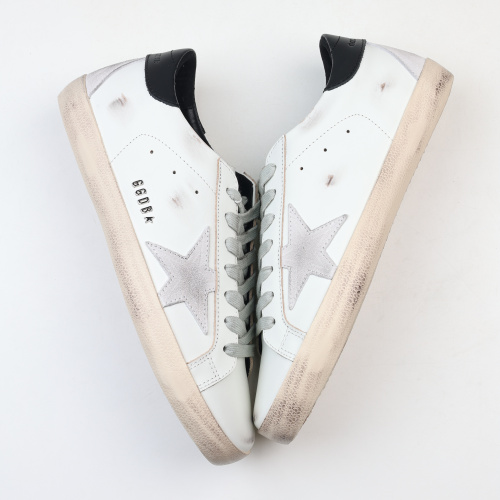 Golden G00se Super-Star trainers with black heels tab and metal stud lettering