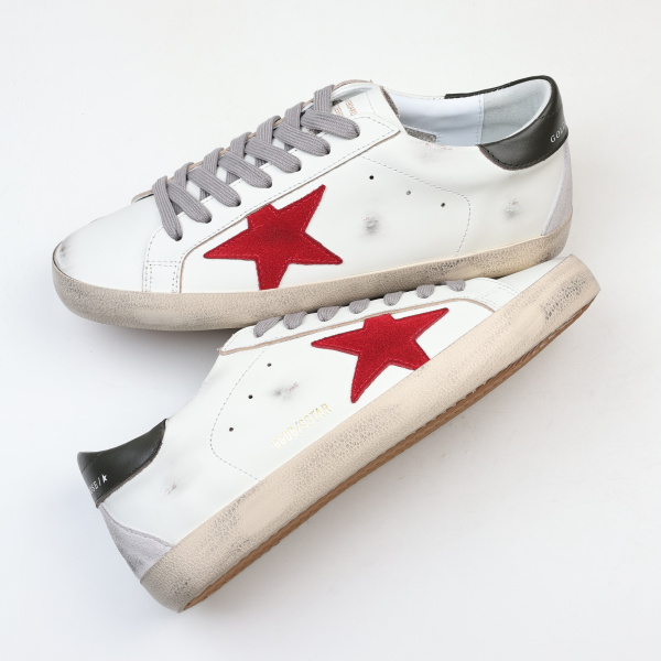 Golden G00se Super-Star trainers with red suede star and green leather heels tab