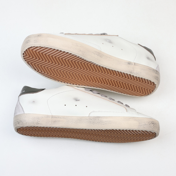 Golden G00se Super-Star trainers with red suede star and green leather heels tab