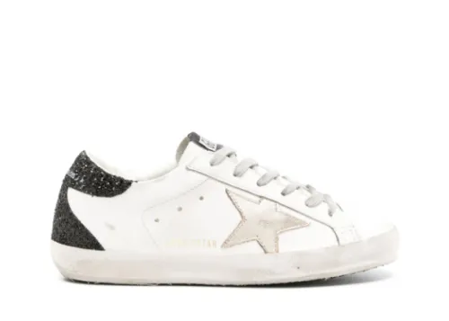 Golden G00se Super-Star trainers with gold star and black glitter heels tab