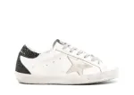 Golden G00se Super-Star trainers with gold star and black glitter heels tab