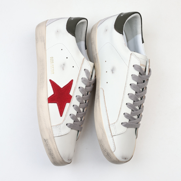 Golden G00se Super-Star trainers with red suede star and green leather heels tab