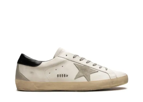 Golden G00se Super-Star trainers with black heels tab and metal stud lettering