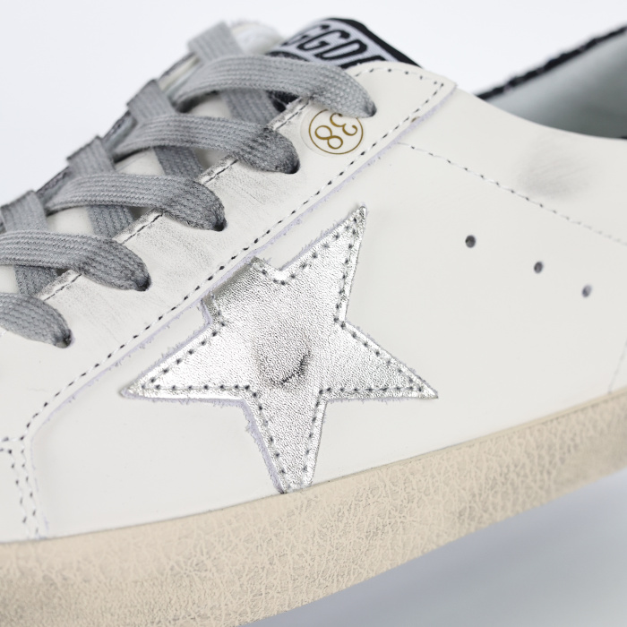 Golden G00se Super-Star With Gold Star And Black Glitter Heel Tab