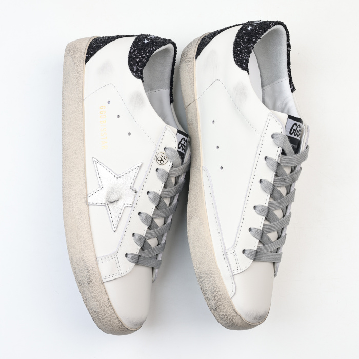 Golden G00se Super-Star With Gold Star And Black Glitter Heel Tab