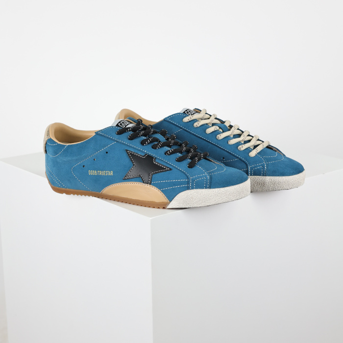 Golden G00se True-Star in teal suede with black star and cream heel tab