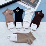 Gucci bronze pure black short cylinder men's and women's socks stockings