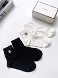Chanel LOGO Midscar socks net eye cotton socks