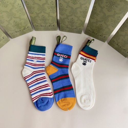 Gucci classic hot seal mid -length pile socks, one box of three doubles