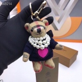 Burberry checkered cashmere Thomas Teddy Love sweater pearl necklace and keychain