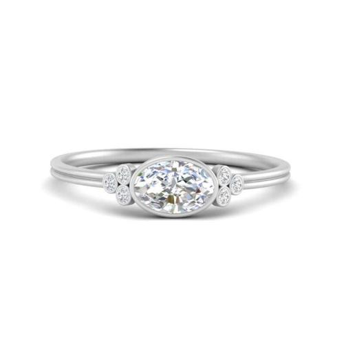 Delicate Bezel Cluster Oval Cut Sterling Silver Engagement Ring In White Gold