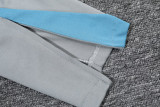 2024/25 A MAD Blue Half Pull Tracksuit