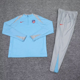 2024/25 A MAD Blue Half Pull Tracksuit