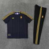 26/27 Man Utd Black Short shirts and Long trousers Tracksuit