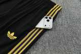 26/27 Man Utd Black Short shirts and Long trousers Tracksuit