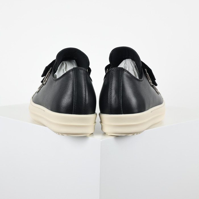 R!ck Owens Low Strap Sneaks in black leather with a white toe cap and sole