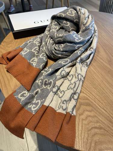 G*U This shawl is derived from the pattern of the brand's double G jacquard denim fabric