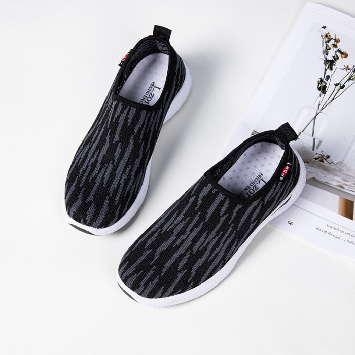 New Casual Flat Bottom Slip-on Lazy Breathable Flying Weaver Girl Sneakers